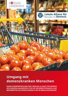 Ein Foto der Broschüre zeigt einen Einkaufswagen mit Tomaten